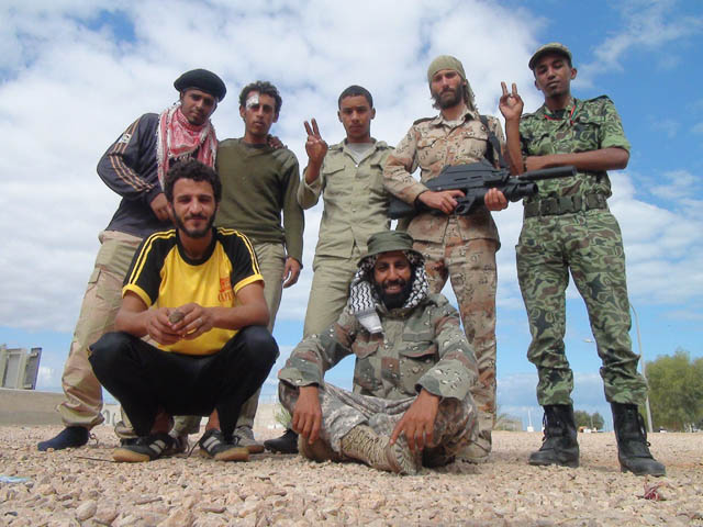 Matthew VanDyke with Libyan rebel fighters during the Libyan Civil War